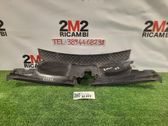 Plaque avant support serrure de capot