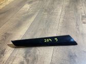 Front door trim bar