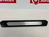 Side skirt front trim