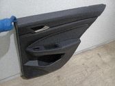 Moldura del tarjetero de la puerta trasera