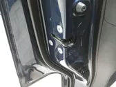 Coupe-mallin oven lukko (kahvan vieressä)