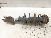 Front shock absorber with coil spring