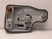 Tail light bulb cover holder