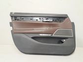 Front door card panel trim