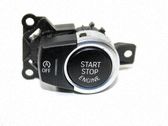 Bouton poussoir de démarrage du moteur