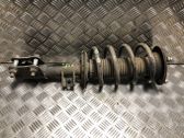 Front shock absorber with coil spring