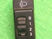 Headlight level height control switch