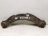 Rear suspension control arm