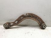 Rear suspension control arm