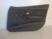 Front door card panel trim