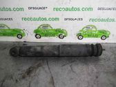 Front shock absorber with coil spring