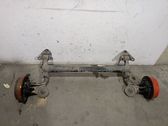Rear axle beam with reductor