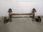 Rear axle beam with reductor