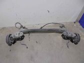 Rear axle beam with reductor