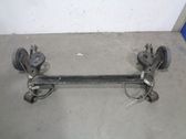 Rear axle beam with reductor