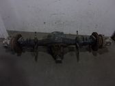 Rear axle beam with reductor