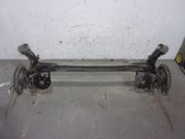 Rear axle beam with reductor
