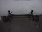 Rear axle beam with reductor