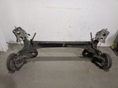 Rear axle beam with reductor