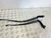 Front wiper blade arm