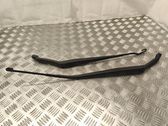 Front wiper blade arm