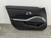 Front door card panel trim
