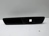Front door window switch trim