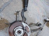 Front wheel hub spindle knuckle
