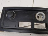 Cigarette lighter trim rear