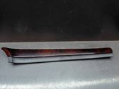 Front door trim bar