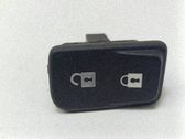 Botón interruptor de bloqueo de puertas
