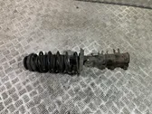 Front shock absorber with coil spring