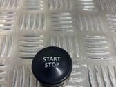 Bouton poussoir de démarrage du moteur