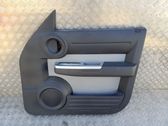 Front door card panel trim