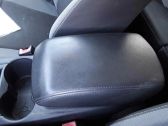 Apoyabrazos del asiento trasero