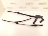 Front wiper blade arm