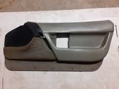 Front door card panel trim