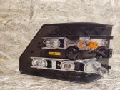 Tail light bulb cover holder