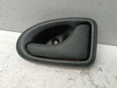 Poignée inférieure de porte avant
