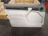 Front door card panel trim