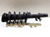 Front shock absorber with coil spring