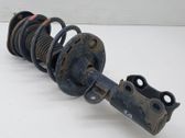 Front shock absorber with coil spring