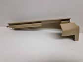 Front passenger seat rail trim