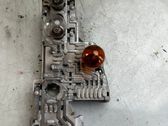 Tail light bulb cover holder