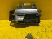 Manecilla interna puerta delantera