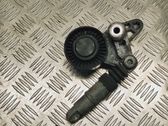 Alternator belt tensioner