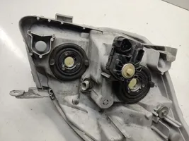 Toyota Corolla Verso E121 Lampa przednia 9922679004