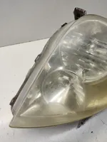 Toyota Corolla Verso E121 Lampa przednia 9922679004