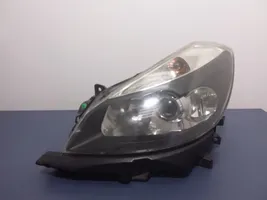 Renault Clio III Lampa przednia 7701061075