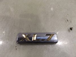 Suzuki Grand Vitara I Logo/stemma case automobilistiche 